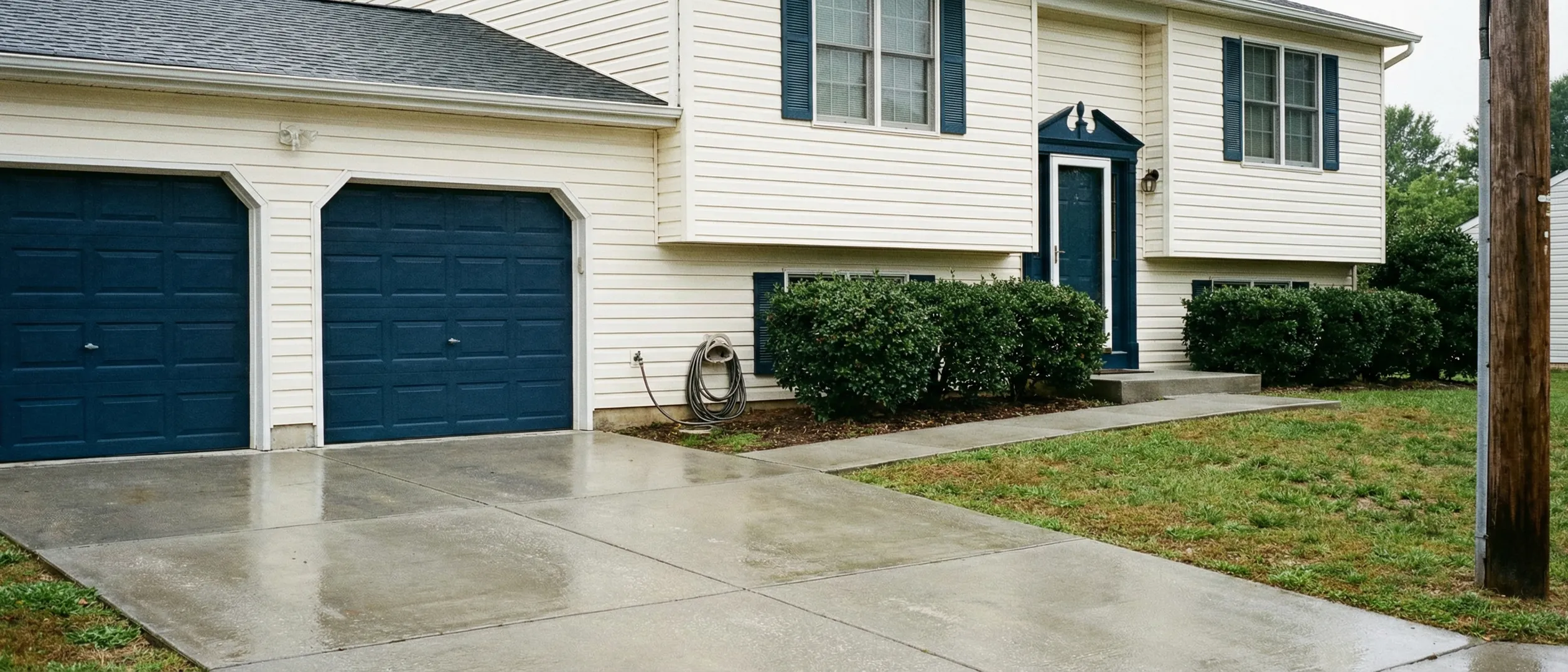 Home exterior being power washed by Greystone Painting in Front Royal, Virginia