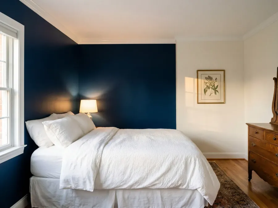 Bedroom with professionally painted accent wall in a modern color palette