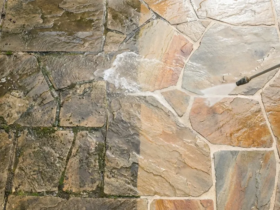 Fence and gutter cleaning with professional power washing equipment